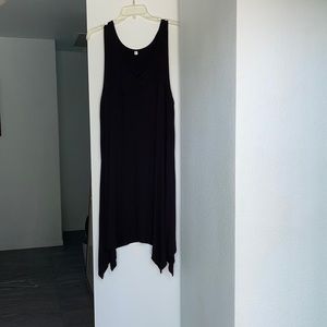 Bathing suit cover up with jagged bottom.